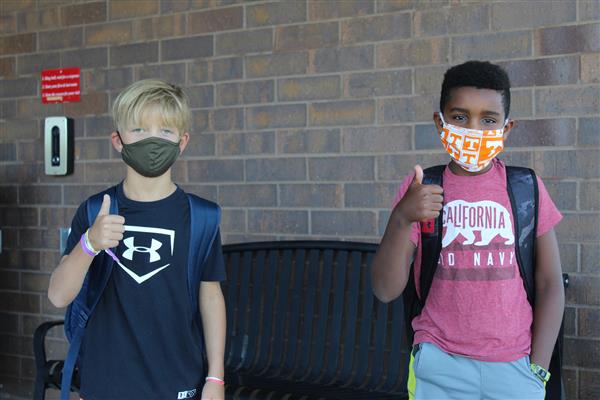 students smile on first day of school